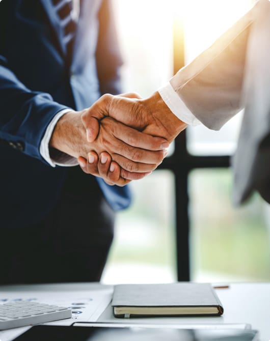 Two attorneys handshaking